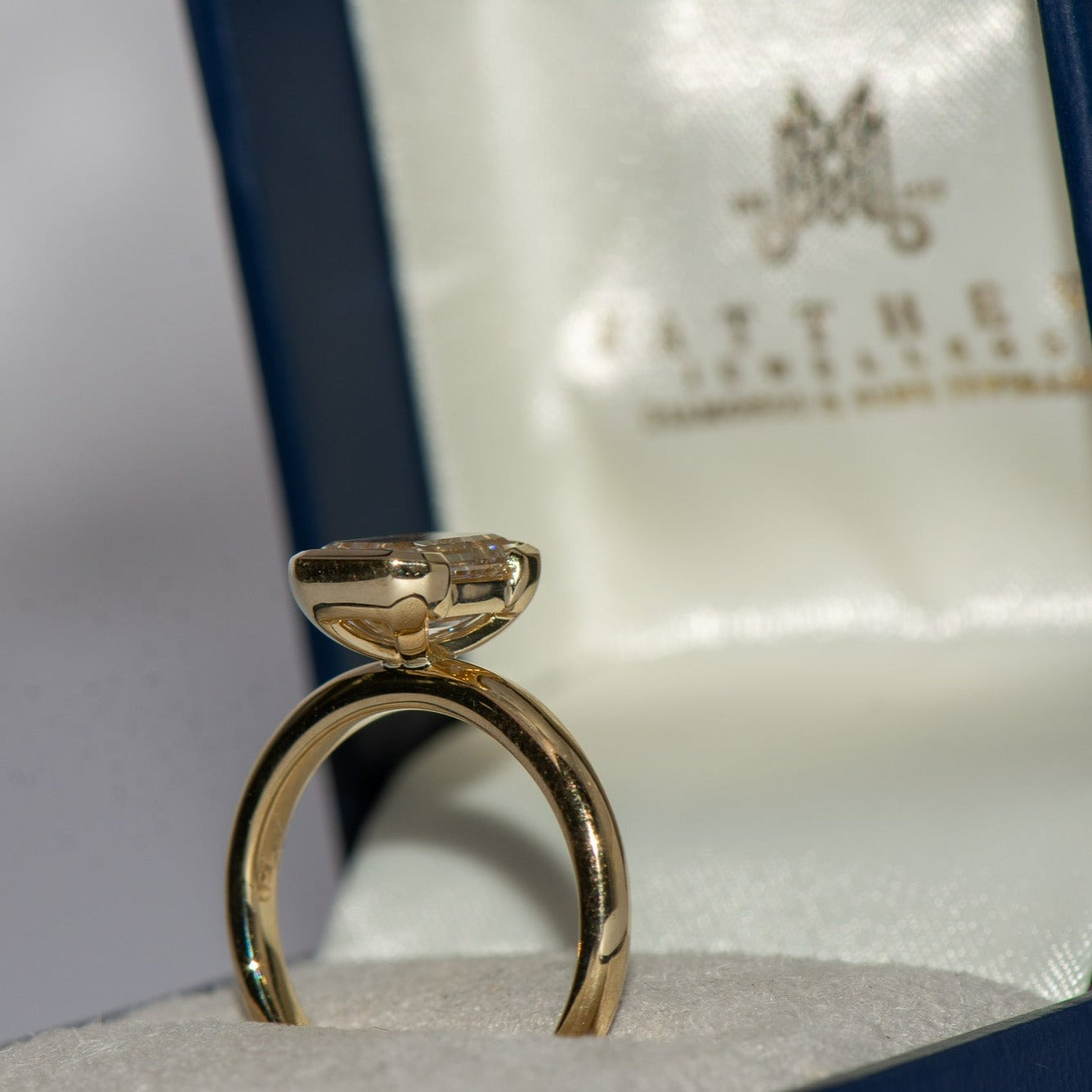 2.51ct Edith | Half Bezel Emerald Cut Engagement Ring | R2W