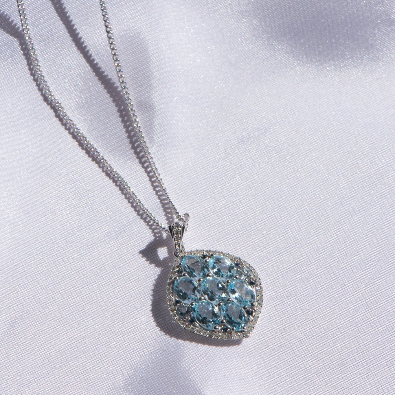 Blue Topaz, Sapphire and Diamond Pendant