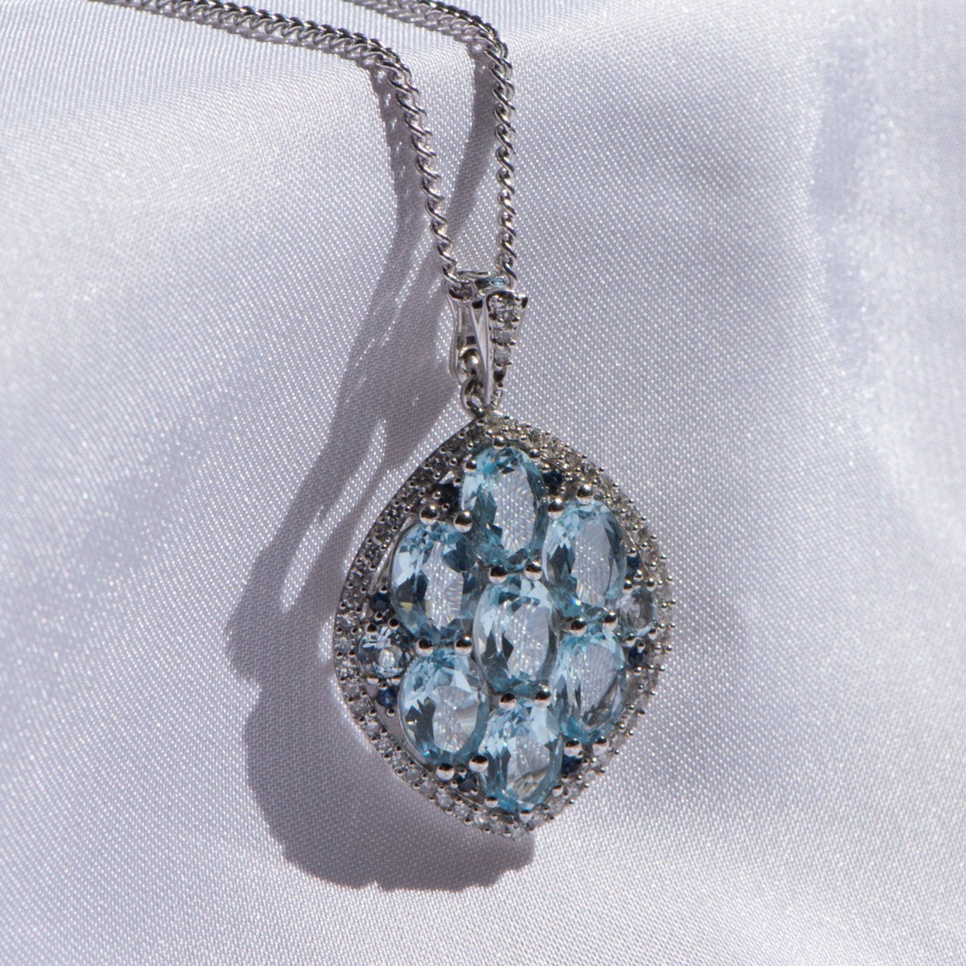 Blue Topaz, Sapphire and Diamond Pendant